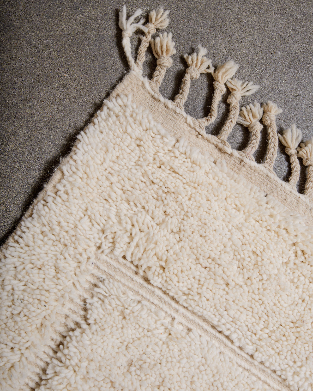 Modern, designer, handcrafted Berber rug from Morocco. Beniourain carpet with beautiful colours and patterns and fluffy wool texture.